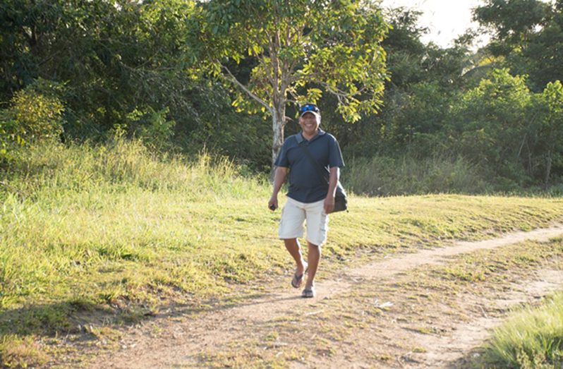 A resident walking through Wakapau Village (DPI photo)