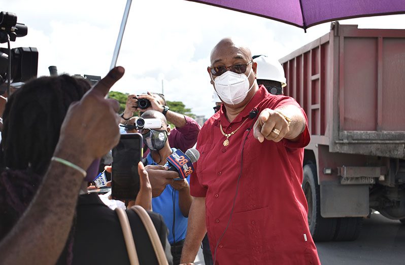 Minister of Public Works, Juan Edghill, during an inspection of the Sheriff Street-Mandela Avenue Project, on Tuesday (Elvin Croker photo)
