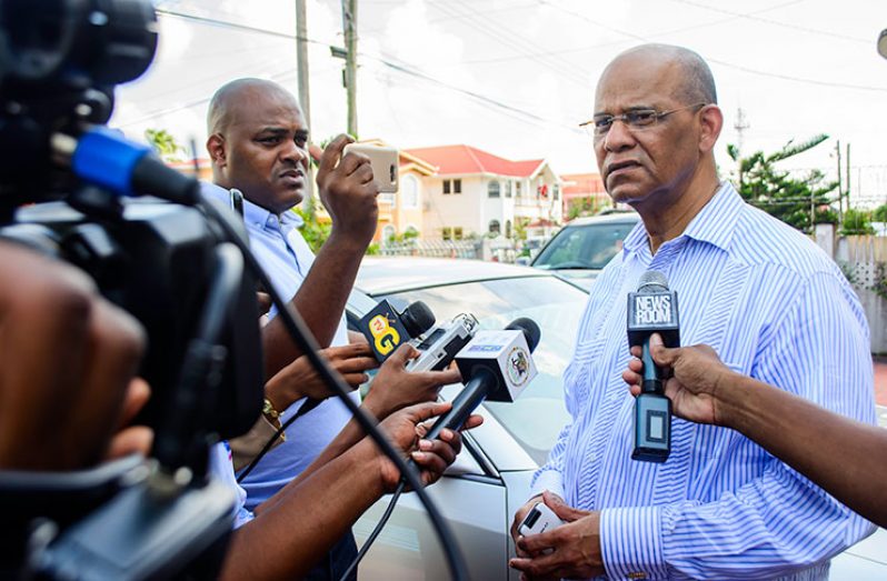 PPP General -Secretary Clement Rohee speaks with the media after investigators had left his Eccles, East Bank Demerara home