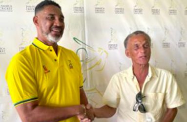 New Jamaica Scorpions coach Robert Haynes (left) and Jamaica Cricket Association President Dr. Donovan Bennett