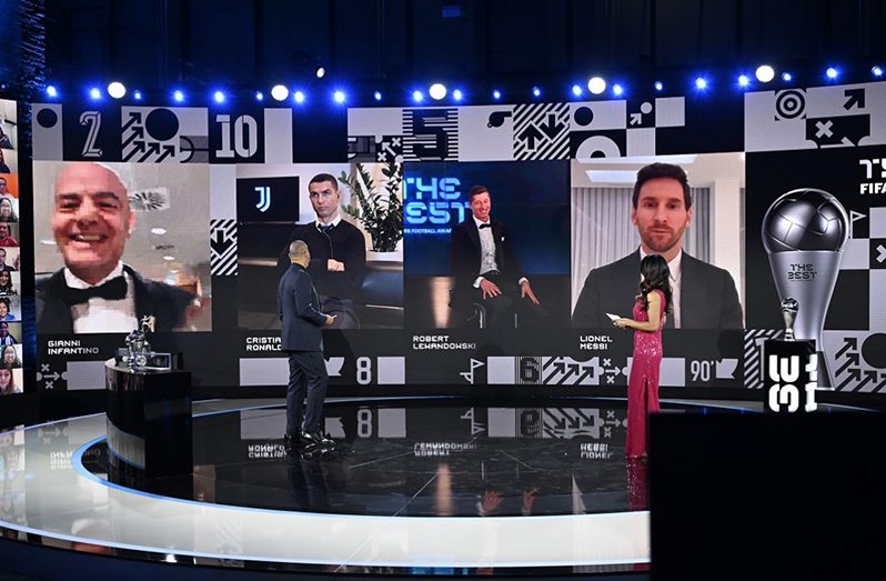 The nominees for The Best FIFA Men's Player, Cristiano Ronaldo, Robert Lewandowski and Lionel Messi look on with FIFA president Gianni Infantino. (Photo: Reuters)