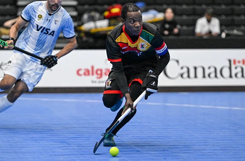 National hockey skipper Robert France on the go against Argentina