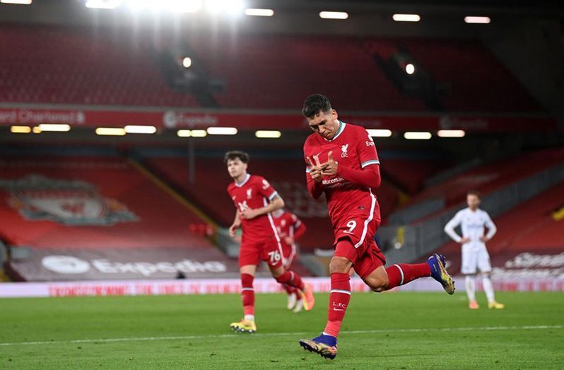 Liverpool v Leicester City - Anfield, Liverpool, Britain - November 22, 2020 Liverpool's Roberto Firmino celebrates scoring their third goal Pool via REUTERS/Laurence Griffiths