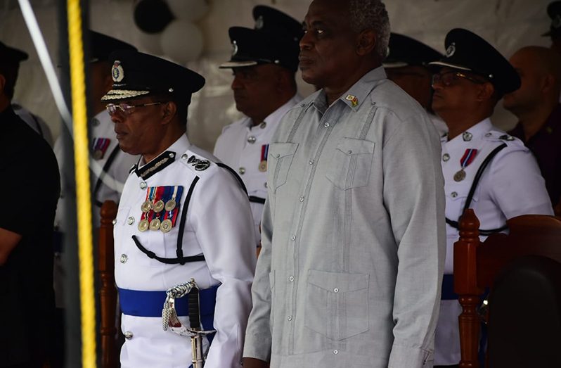 From left: Commissioner of Police (ag), Clifton Hicken and Minister of Home Affairs, Robeson Benn, during the wreath-laying ceremony