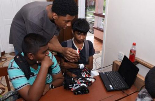 Children at work at the robotics building and programming camp in 2016