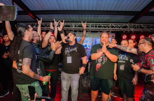 A member of Puerto Rico’s ‘Left-Ovr’, drink from the Wacken Horn to celebrate the band’s win