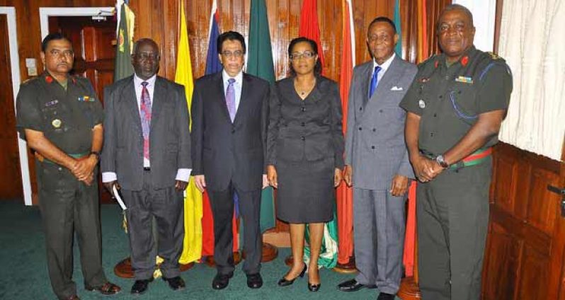 In photo from left,  Deputy CoS Kemraj Persaud , Hugh Denbow (facilitator), Seenauth Jairam, Jacqueline Samuels-Brown, Sir Richard Cheltenham and CoS Brigadier Mark Phillips at Defence Headquarters