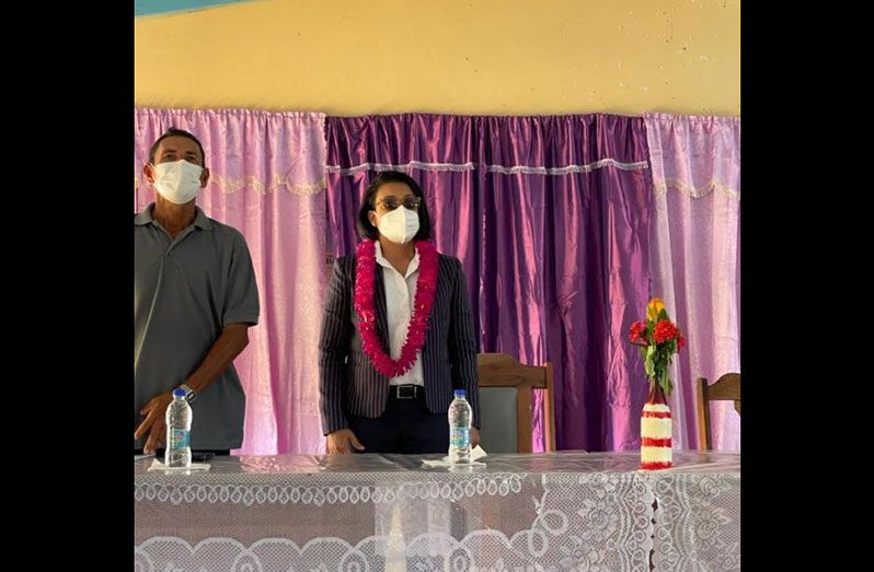 Minister within the Ministry of Housing and Water, Susan Rodrigues, before addressing residents in Wakapoa, Pomeroon River