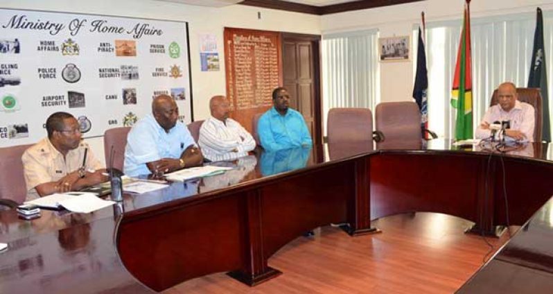 Minister of Home Affairs, Clement Rohee during a meeting with members of the Board of Inquiry, which includes Tajnauth Jadunauth, Dennis Pompey and Clifton Hicken