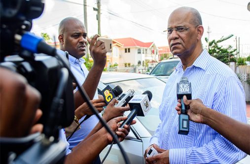 General Secretary of the PPP and former Home Affairs Minister, Clement Rohee speaking to reporters following the robbery of his home. [Samuel Maughn photo]