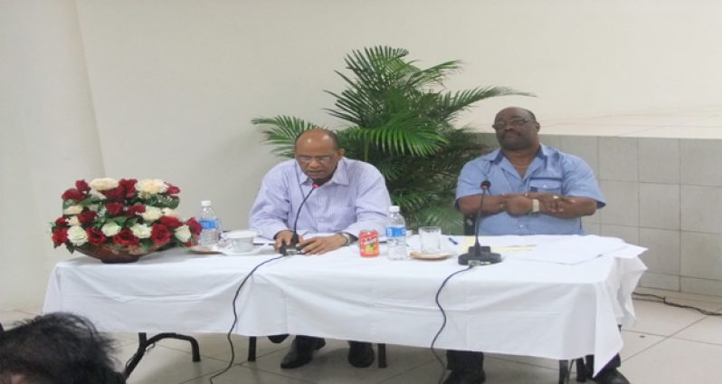 Minister Clement Rohee with Commissioner of Police Leroy Brumell during the meeting.