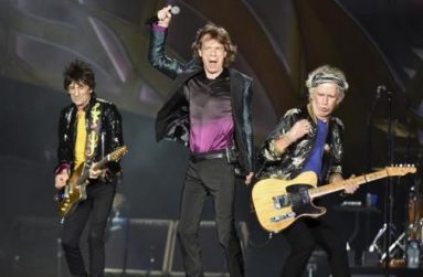 British veteran rockers The Rolling Stones lead singer Mick Jagger performs in front of bandmates Ron Wood (L) and Keith Richards during a concert on their North American ''Zip Code'' tour in Nashville, Tennessee June 17, 2015.