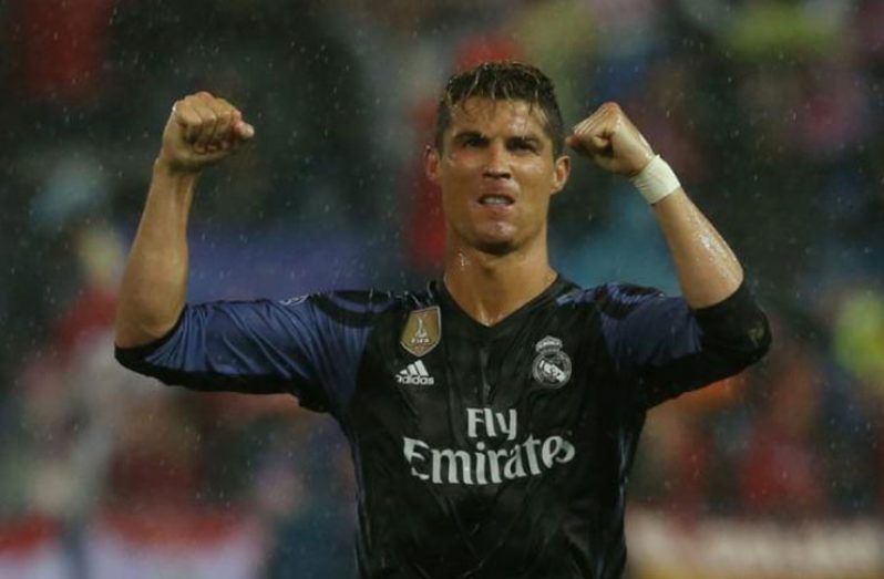 Real Madrid's Cristiano Ronaldo celebrates after the match. (Reuters/Sergio Perez Livepic)