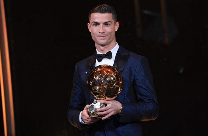 Cristiano Ronaldo collects his fifth Ballon d'Or yesterday.