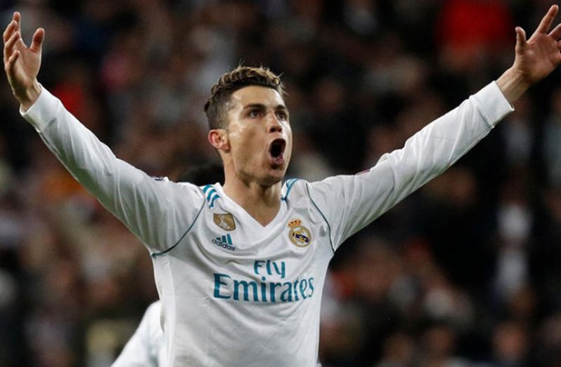 Ronaldo penalty sends Real through.