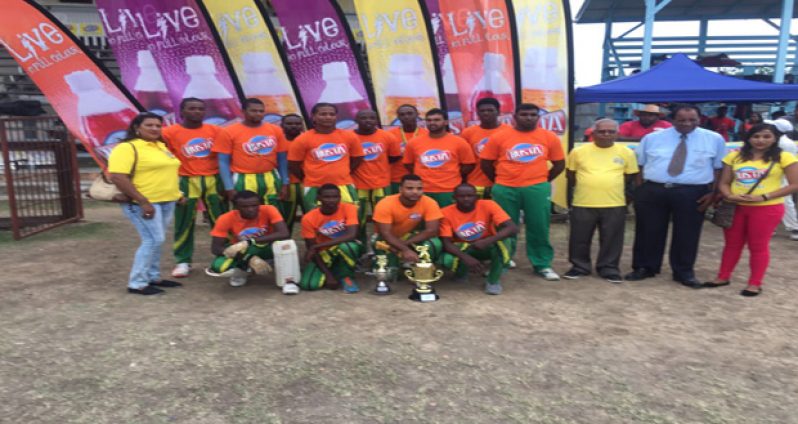 The winning Rose Hall Town Gizmos and Gadgets team pose with Managing Director Robert Selman, Marketing Manager Shameiza Yadram and other staff members of the company.