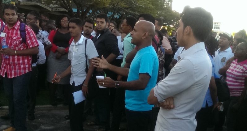 ‘AMUSING’: AFC activist Mark Ross (both hands up) during his campaigning yesterday