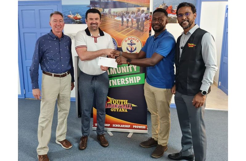 Ross Chouest, handed over the sponsorship cheque to YBG’s Chris Bowman, with Daniel LaFont and Rayad Boyce, co-Director YBG, looking on