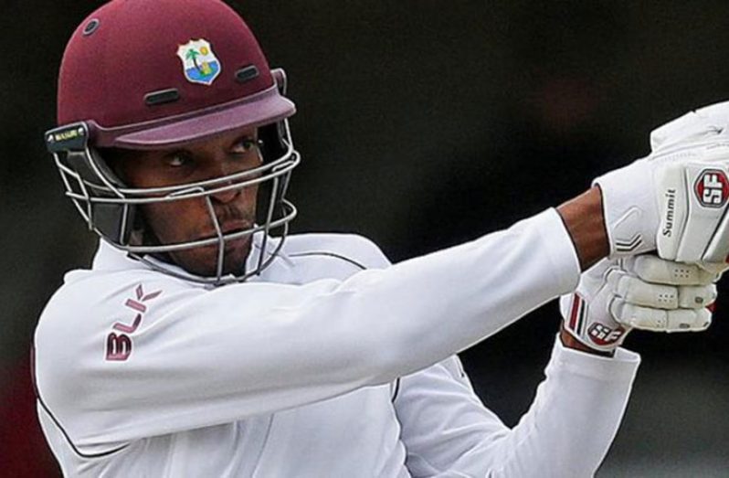 Roston Chase carves out his second half-century of the match.
