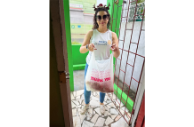 President of the Rotary Club of Demerara, Cameron Domanique, delivers breakfast of bake and saltfish to residents of Archer’s and Byer’s Senior Citizens’ Homes early in the morning, ahead of their 7:30 a.m. mealtime, before the club began decorating for the holidays