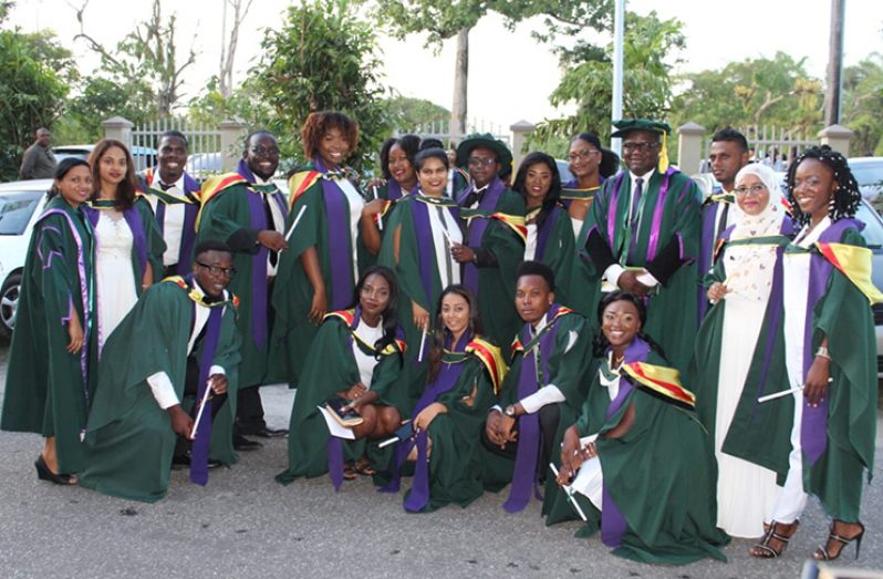 A section of the graduating class with the Assistant Dean and Dean of the Faculty of Natural Sciences.