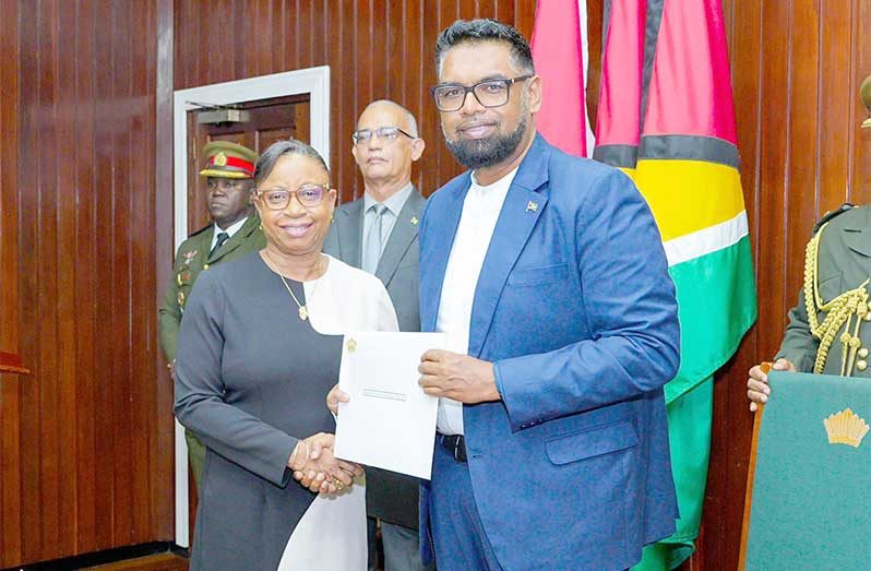 Justice Roxane George-Wiltshire, S.C. (PC: President Irfaan Ali/Facebook) accepts her instrument of appointment from President, Dr Irfaan Ali