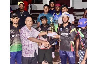 Flashback: Joint winners, Rude Boy XI, pose with their winnings in the recently concluded One Guyana Berbice Softball Cup.