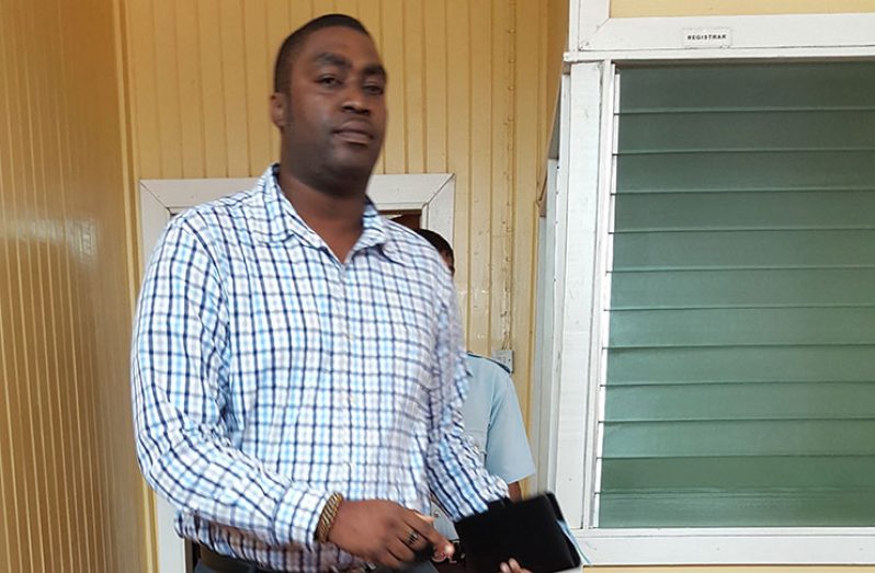 Freed: Ruel Brandon walks out the Georgetown High Court on Wednesday [Michel Outridge photo]