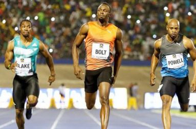 Jamaica National Racers Grand Prix: Yohan Blake (L), winner Usain Bolt (C) and Asafa Powell in action during men's 100m race.