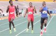 Rusheen McDonald (right) romps to victory in the men’s 400 metres.