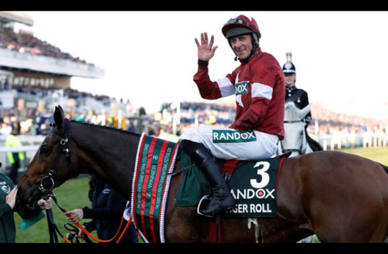 Jockey  Davy Russell celebrates winning the Grand National with Tiger Roll. Photograph: Paul Childs/Action Images via Reuters