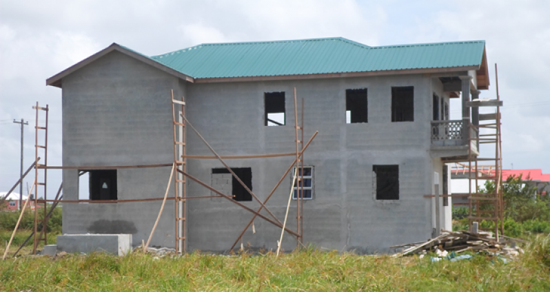 Approximately 18  to 20  windows and two doors are now missing from this house that is currently under construction at Parfait Harmonie. The windows are said to have cost more than $400,000.