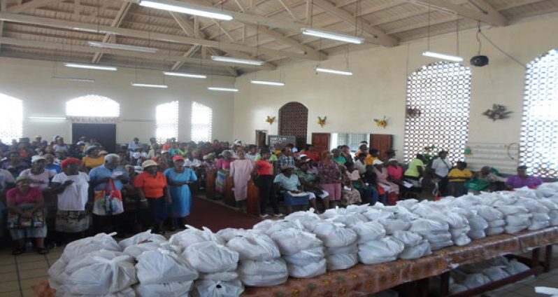 Senior citizens gratefully assembled for the Salvation Army’s Christmas Hampers distribution on Monday