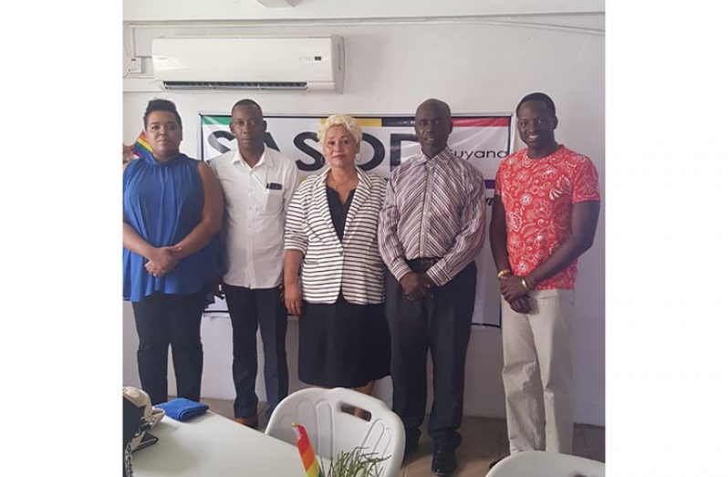 Kingdom Liberal Movement (KLM) party members meet with the Society Against Sexual Orientation Discrimination (SASOD). Standing from left to right are: Ms Valini Leitch (SASOD); KLM Campaign Strategist Apostle Y. Abernaty Jeune; Sister Lurline Smith (KLM); KLM presidential candidate Bishop Linden Hercules and Founder and Managing-Director of SASOD, Joel Simpson