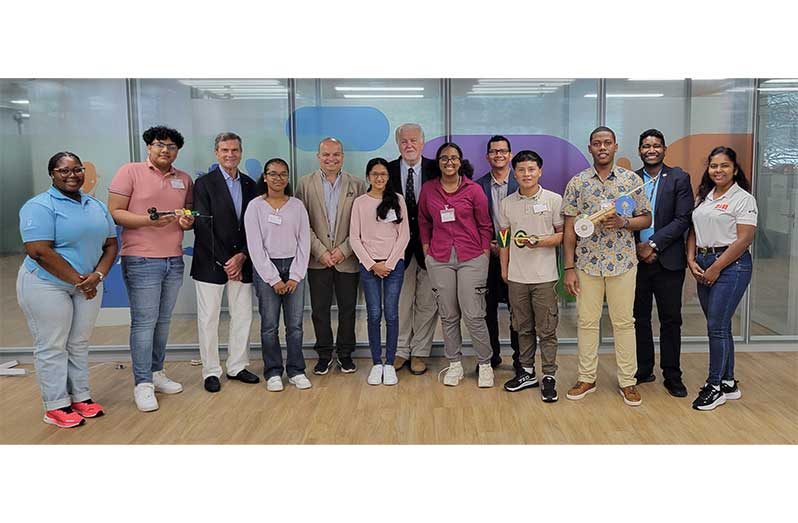 Winners of the 2025 Guyana- Monaco Mousetrap Car Grand Prix assembled with CEO of SBM Offshore, Oivind Tangen and the founder of the Mousetrap Competition, Mr Marco Casiraghi, with fellow SBM Offshore representatives