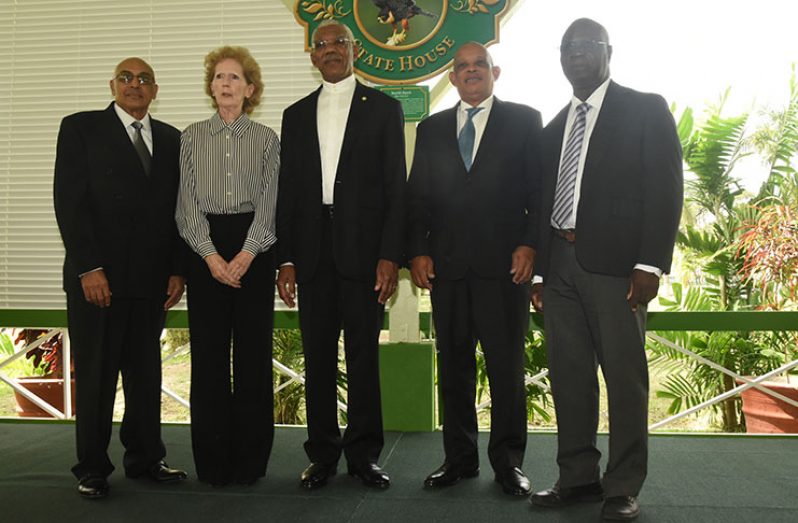 President David Granger (centre) stands alongside newly appointed Senior Counsel, Kalam Azad Juman Yassin (left), Josephine Whitehead (second left), Andrew Mark Fitzgerald Pollard (second right) and Fitz Le Roy Peters (right). (Adrian Narine)