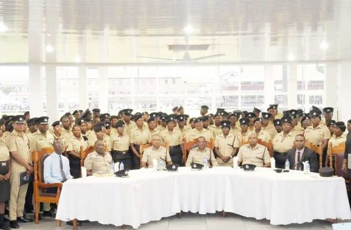 Commissioner of Police, Clifton Hicken (seated centre), flanked by Deputy Commissioners and senior ranks, along with Special Constabulary members (SC) within the Guyana Police Force (GPF)