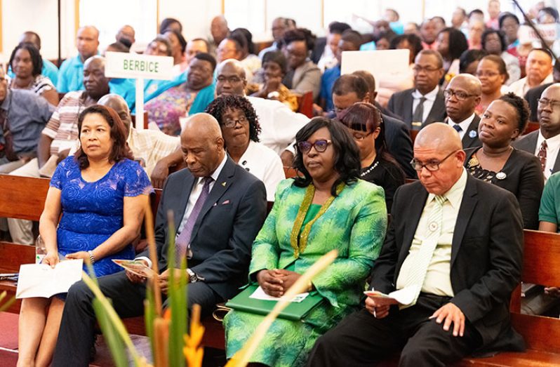 Seated from left at the Central SDA church for the Fifth Quadrennial Session of the Guyana Conference of SDA are: Minister of Public Affairs Dawn Hastings-Williams; Minister within the Ministry of Public Health, Dr. Karen Cummings and Minister of Social Cohesion, Dr. George Norton (fourth left) (Samuel Maughn photo)