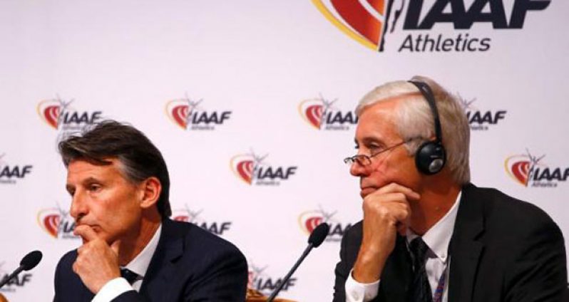 President Sebastian Coe (L) and Rune Andersen, head of the IAAF taskforce on Russia, attend a news conference after the International Association of Athletics Federations (IAAF) council meeting in Vienna, Austria, yesterday. (Reuters/Leonhard Foeger)