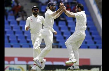 Mohammed Shami celebrates the wicket of Marlon Samuels. He went on to finish with  four for 66.