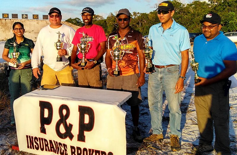 Prize-winners 2018 of the P&P-sponsored GSSF’s Practical Pistol Match. From left: Mrs Vidushi Persaud-McKinnon, Dr Johan DaSilva, Mr Ryan McKinnon, Mr Rajiv Latchana, Mr Andrew Phang and Mr David Dharry