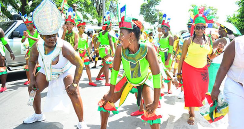 Not backing down! Minister within the Ministry of Natural Resources, Simona Broomes, challenges another reveller in a dance-off as they marked Guyana’s 50th Independence Anniversary