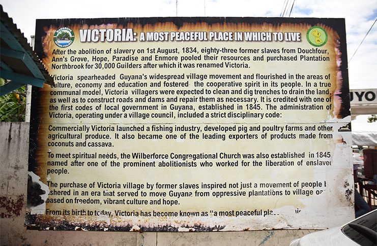 A sign with a historical synopsis of the village of Victoria (Samuel Maughn photo)