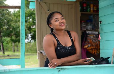 Abiola Barron in her shop outside the Bamia School compound