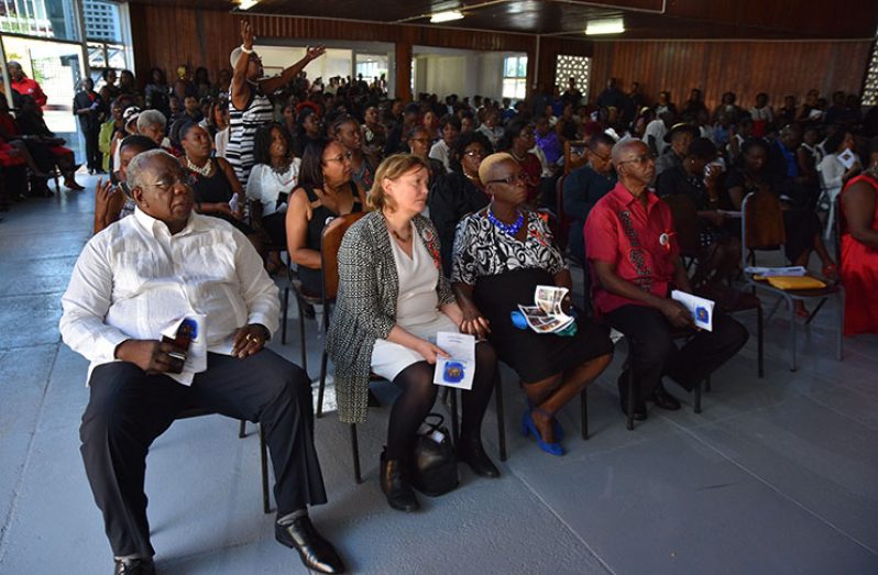Seated from left are: Mr. Clinton Williams, CEO of the Guyana National Industrial Corporation (GNIC); Ms. Sarah Finke and Ms Wilma Clement of the International Transport Workers’ Federation (ITF); and CCWU Past President, Mr. Grantley Culbard