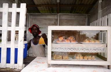 Charles Mendonca at the food stand in the back dam