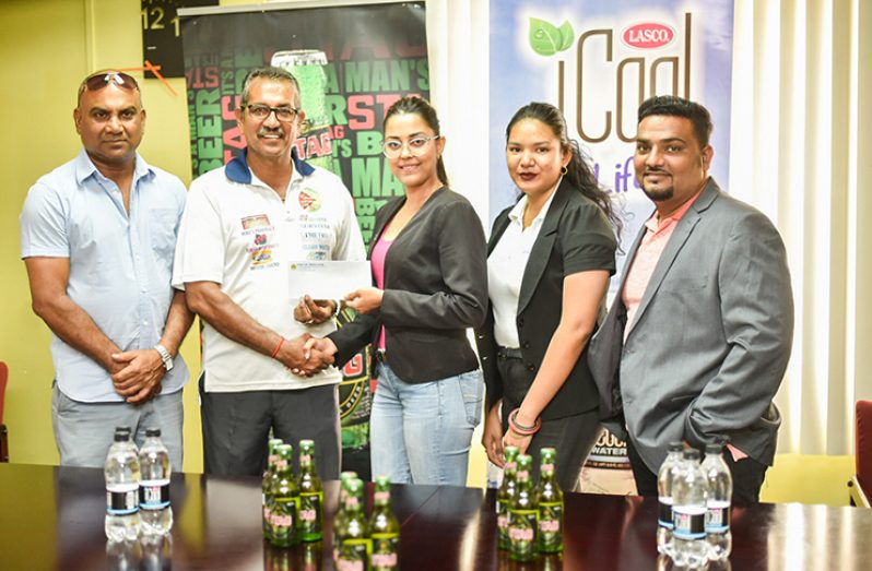 : (L-R) Guyana Floodlight Softball Cricket Association (GFSCA) vice-president, Jailall Deodass; GFSCA executive member, Ricky Deonarine; Ansa McAL's Marketing Assistant, Gabriell Lopes; Marketing Assistant, Olivia Chin and Beverage Divisional Head, Kelvin Singh.