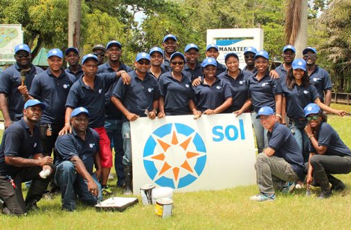 SOL Sol Guyana employees in the Botanical Gardens