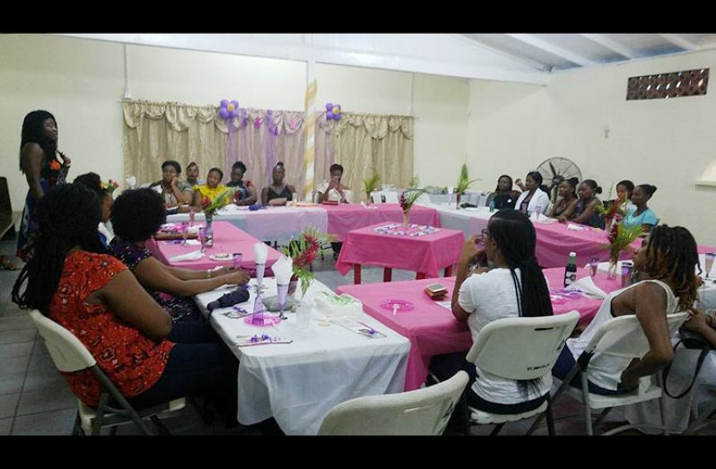 Guest Speaker, Ms. Elsie Harry (standing) conducting a session on women empowerment