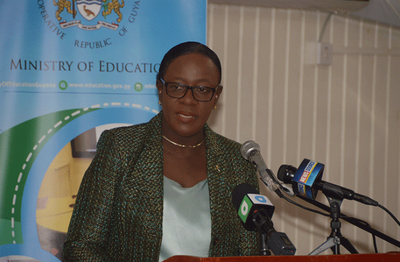 Minister of Education Dr. Nicolette Henry speaking at the announcement of this year’s NGSA results